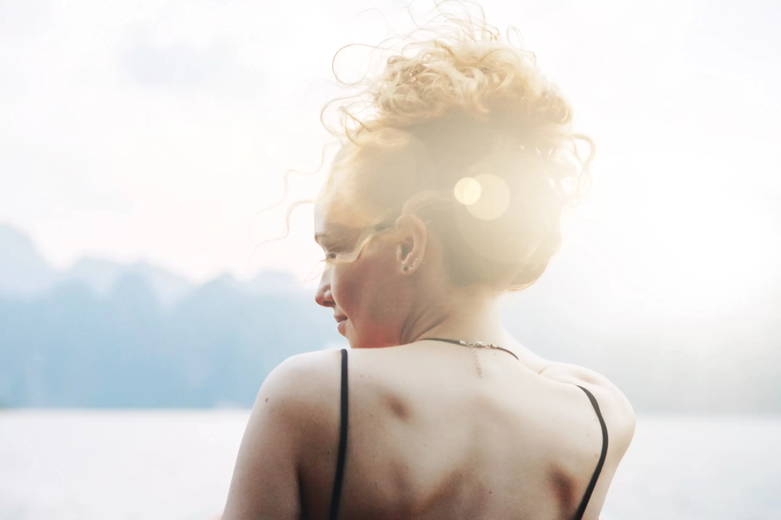 Woman reflecting and staring into the distance